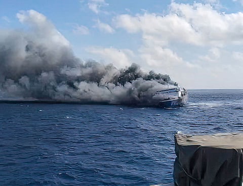 Passenger ship Mutiara Sentosa 2 catching fire in the waters off Madura island, East Java.