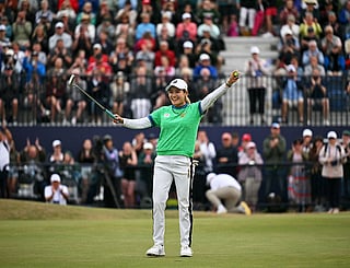 Japan's Shiho Kuwaki celebrates winning on the 18th green after a second playoff round on the final day of the 2026 Women's British Open Golf Championships at Royal Lytham & St. Annes Golf Club, north-west England