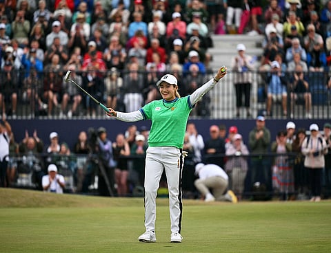 Japan's Shiho Kuwaki celebrates winning on the 18th green after a second playoff round on the final day of the 2026 Women's British Open Golf Championships at Royal Lytham & St. Annes Golf Club, north-west England