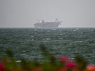 Oman-mediated Strait of Hormuz talks continue amid US military pressure.