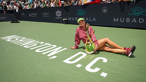 Alexandra Eala of the Philippines poses with the Championship Trophy after winning the women's singles championship match against Jessica Pegula of the United States on the final day of the Mubadala DC Open 2026 at William H.G. FitzGerald Tennis Center on August 3, 2026 in Washington, DC. 