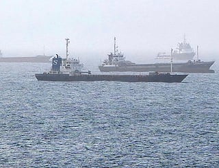 Vessels transiting through the Gulf of Oman are pictured off the coast of Muscat on July 25, 2026. An incident involving a tanker and unspecified military forces was reported on July 25 near the Strait of Hormuz waterway, according to the United Kingdom Maritime Trade Operations monitor. (Photo by AFP) /