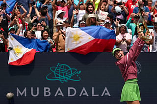 Alexandra Eala of the Philippines holds the Championship Trophy after winning the women's singles championship match against Jessica Pegula of the United States on the final day of the Mubadala DC Open 2026 at William H.G. FitzGerald Tennis Center on August 3, 2026 in Washington, DC. 