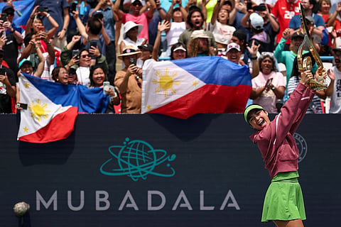 Alexandra Eala of the Philippines holds the Championship Trophy after winning the women's singles championship match against Jessica Pegula of the United States on the final day of the Mubadala DC Open 2026 at William H.G. FitzGerald Tennis Center on August 3, 2026 in Washington, DC. 