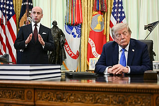 US President Donald Trump looks on as White House Deputy Chief of Staff Stephen Miller (L) speaks about birth rights in the Oval Office of the White House in Washington, DC, on August 7, 2026.