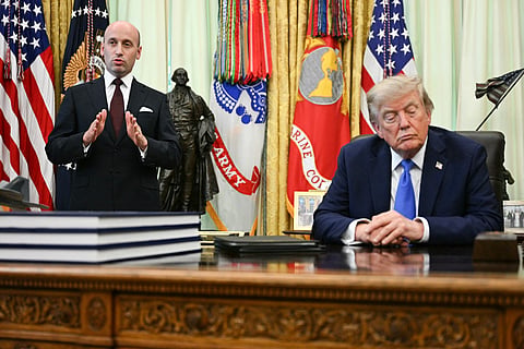 US President Donald Trump looks on as White House Deputy Chief of Staff Stephen Miller (L) speaks about birth rights in the Oval Office of the White House in Washington, DC, on August 7, 2026.