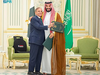 Pakistani Prime Minister Shehbaz Sharif with Saudi Arabia's Crown Prince Mohammed bin Salman. 