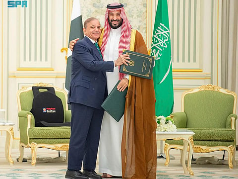 Pakistani Prime Minister Shehbaz Sharif with Saudi Arabia's Crown Prince Mohammed bin Salman. 