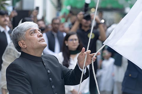 Pakistan’s Ambassador to the UAE, Shafqat Ali Khan, cuts a cake during Pakistan’s Independence Day celebrations at the Embassy in Abu Dhabi.