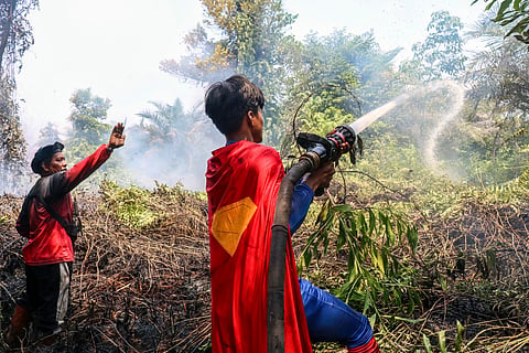 'Keep up the spirit': Indonesian teenage 'Superman' joins wildfire fight