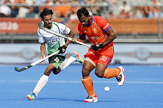 India's Amit Rohidas (R) and Pakistan's Muhammad Ammad (L) fight for the ball during the 2026 FIH Men's Hockey World Cup group stage match between Pakistan and India at the Wagener Stadium in Amstelveen, western Netherlands, on August 19, 2026.