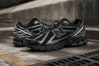 New Balance 1906R sneakers displayed in an urban setting