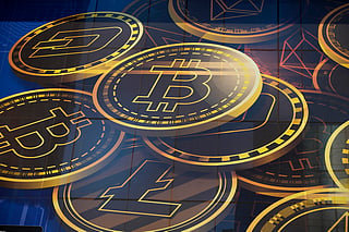 A representation of cryptocurrencies. The US Treasury has sanctioned Iranian cryptocurrency exchange BitBank, accusing it of moving hundreds of millions of dollars to Iran’s Islamic Revolutionary Guard Corps (IRGC) and processing payments linked to shipping access through the Strait of Hormuz. For illustrative purposes only.