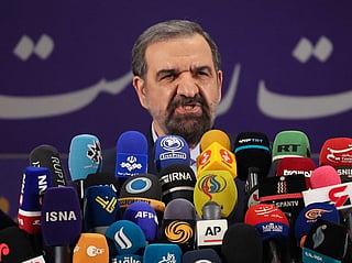Iranian former chief of the Revolutionary Guards Mohsen Rezaei talks to the media  