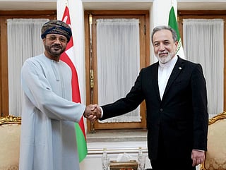 Omans' Foreign Minister Sayyid Badr Albusaidi, the Foreign Minister of Oman (left) with Iranian Foreign Minister Abbas Araghchi seen in this handout picture provided by the Iranian Foreign Ministry Office. File photo taken on August 25, 2026. 