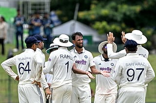India's Prasidh Krishna (C) celebrates with teammates after taking the wicket of Sri Lanka's Kamindu Mendis during the third day of the second Test cricket match between Sri Lanka and India at the Sinhalese Sports Club Ground in Colombo on August 25, 2026.