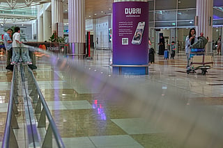 Passengers leave the baggage claim hall at Terminal 3 of Dubai International Airport in Dubai, United Arab Emirates, Wednesday, Aug. 26, 2026.