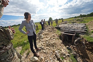 Britain's Armed Forces Minister Louise Sandher-Jones watches a trench assault capability demonstration, during a visit to UK Forward Land Forces, deployed as part of Operation Cabrit, at Tapa Camp near Tapa, Estonia on August 26, 2026.