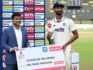 India's Devdutt Padikkal (R) receives Player of the Series trophy in the end of the fifth day of the second Test match against Sri Lanka at the Sinhalese Sports Club Ground in Colombo on August 27, 2026.