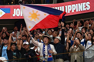 Supporters of Philippines' team celebrate win against Jordan during the 2027 FIBA Basketball World Cup Asian qualifier group E match at the Mall of Asia Arena in Pasay city, Metro Manila on August 28, 2026.
