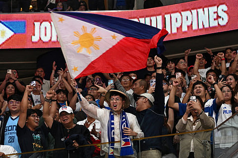 Supporters of Philippines' team celebrate win against Jordan during the 2027 FIBA Basketball World Cup Asian qualifier group E match at the Mall of Asia Arena in Pasay city, Metro Manila on August 28, 2026.