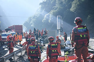 Fire and rescue personnel prepare to conduct search and rescue operations at Gyirong Port, which was damaged after a mudslide two days earlier, in Gyirong County, in China’s western Tibet region on August 28, 2026.