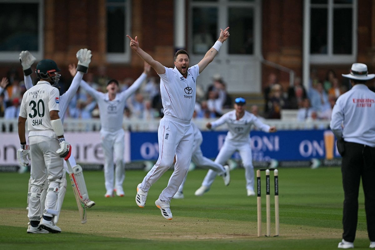 England's Ollie Robinson appeals successfully for a LBW decision against Pakistan's Azan Awais on day four of the second test match between England and Pakistan at Lord's cricket ground in London on August 30, 2026.