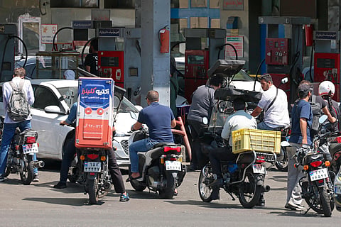 Motorists queue for fuel in Iran as economic pressure and uncertainty over petrol prices add to concerns about renewed public unrest.