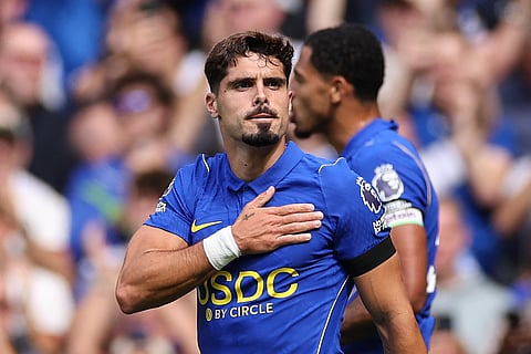 Chelsea's Portuguese midfielder #07 Pedro Neto (R) celebrates after scoring the team's second goal during the English Premier League football match between Chelsea and Brighton and Hove Albion at Stamford Bridge in London on August 30, 2026.