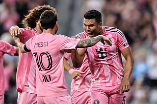 Casemiro and Messi celebrating together 