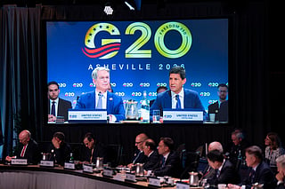 US Secretary of Treasury Scott Bessent and US Federal Reserve chairman Kevin Warsh are displayed on a TV screen as they speak during the G20 Finance Ministers and Central Bank Governors’ meeting in Asheville, North Carolina, on August 31, 2026.