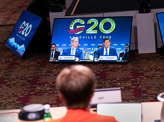 US Secretary of Treasury Scott Bessent and US Federal Reserve chairman Kevin Warsh are displayed on a TV screen as they speak during the G20 Finance Ministers and Central Bank Governors’ meeting in Asheville, North Carolina, on August 31, 2026.