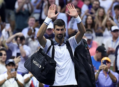 Novak Djokovic thanks the fans after his five set loss against Mariano Navone of Argentina during their Men's Singles First Round match on Day One of the 2026 US Open.