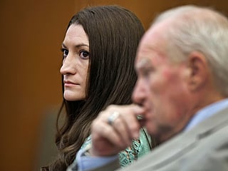 Lindsay Clancy watches jurors enter the courtroom for their second day of deliberations as defense attorney Kevin Reddington sits to her right at Plymouth Superior Court in Plymouth, Mass., Friday, Aug. 28, 2026. 
