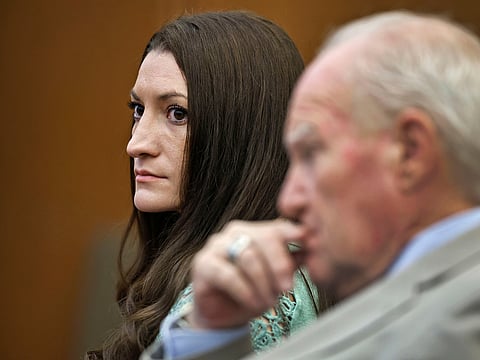 Lindsay Clancy watches jurors enter the courtroom for their second day of deliberations as defense attorney Kevin Reddington sits to her right at Plymouth Superior Court in Plymouth, Mass., Friday, Aug. 28, 2026. 