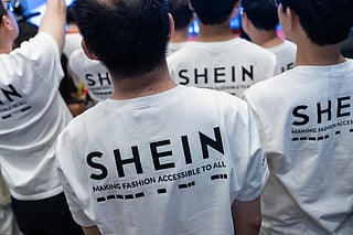 A logo of fast-fashion retailer Shein is seen on the t-shirt at the listing ceremony in Hong Kong, Tuesday, Sept. 1, 2026.