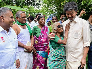 Chellam, delighted by the gesture, later wore the sunglasses and joined Vijay in waving to the crowd. Tamil Nadu Chief Minister S. Joseph Vijay interacted with farmers and enquired about their well-being and agricultural activities after inaugurating the release of water from Mettur Dam for irrigation in the Cauvery Delta districts, in the Chinna Kavoor and Thimirikottai areas of Salem district.