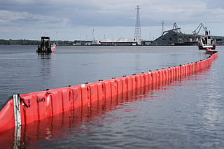 Members of the Finnish Rescue Service take part in a demonstration of the latest system to control oil spilling organised in cooperation with the John Nurminen Foundation on August 26, 2026 in Kotka, Finland.