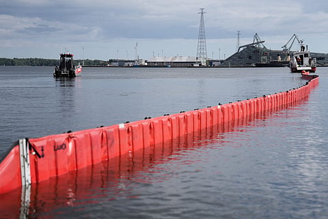 Members of the Finnish Rescue Service take part in a demonstration of the latest system to control oil spilling organised in cooperation with the John Nurminen Foundation on August 26, 2026 in Kotka, Finland.