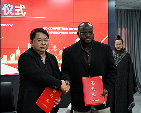 Manuel Zau Polo, President of No Competition Infinity Gaming, and Chairman of Jiangsu Yunmu Intelligent Manufacturing Technology sign a five-year strategic agreement in Taicang, China