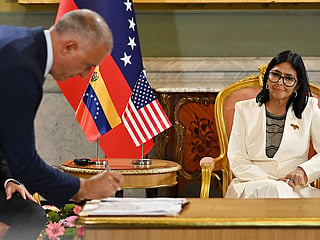 Venezuela's interim President Delcy Rodriguez (R) during the signing of an oil agreement with US Energy Secretary Chris Wright (unseen) at the Miraflores Presidential Palace in Caracas on September 2, 2026.  
