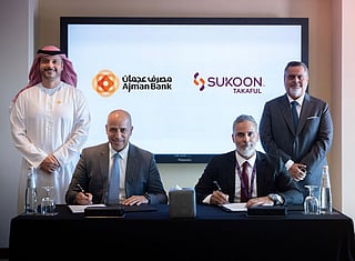 Mustafa al Khalfawi and Ahmed bin Shanab during the MoU singing ceremony.
