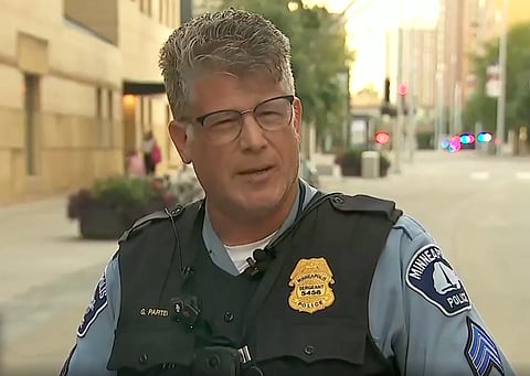 Police Sgt. Garrett Parten two people were killed and several others wounded, including three Minneapolis police officers, after a gunman opened fire Wednesday afternoon inside a high-rise apartment building in downtown Minneapolis, authorities said.