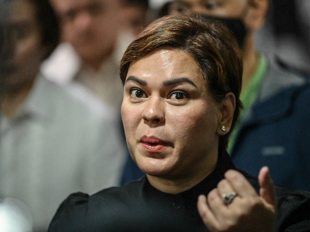 Philippine Vice President Sara Duterte talks to members of the media after posting bail at a court building in Quezon City suburban Manila on September 5, 2026.