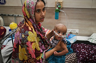 A child receives treatment for measles, at Bangladesh Shishu Hospital & Institute in Dhaka on September 3, 2026. 