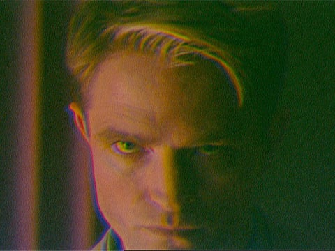 This image released by A24 shows Robert Pattinson, left, in a scene from the film "Primetime." 