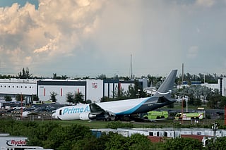 An Amazon cargo plane is seen after it crashed at Miami International Airport on September 06, 2026 in Miami, Florida.