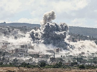 TOPSHOT - A photograph taken from the southern Lebanese village of al-Hanniyeh shows smoke as it rises from the site of an Israeli airstrike that targeted the nearby village of al-Mansouri in September 5, 2026. Israeli strikes in southern and eastern Lebanon late on September 4, 2026, killed at least three people and injured 23, the Lebanese health ministry said. The strikes came despite a truce between Israel and the Iran-backed Hezbollah militant group. (Photo by Kawnat HAJU / AFP) /
