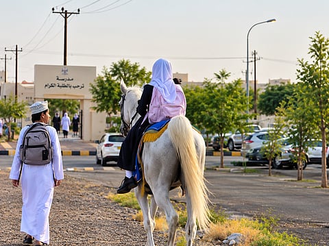 Omani schoolgirl rides horse to school on first day of academic year, wins viral social media praise for celebrating equestrian heritage