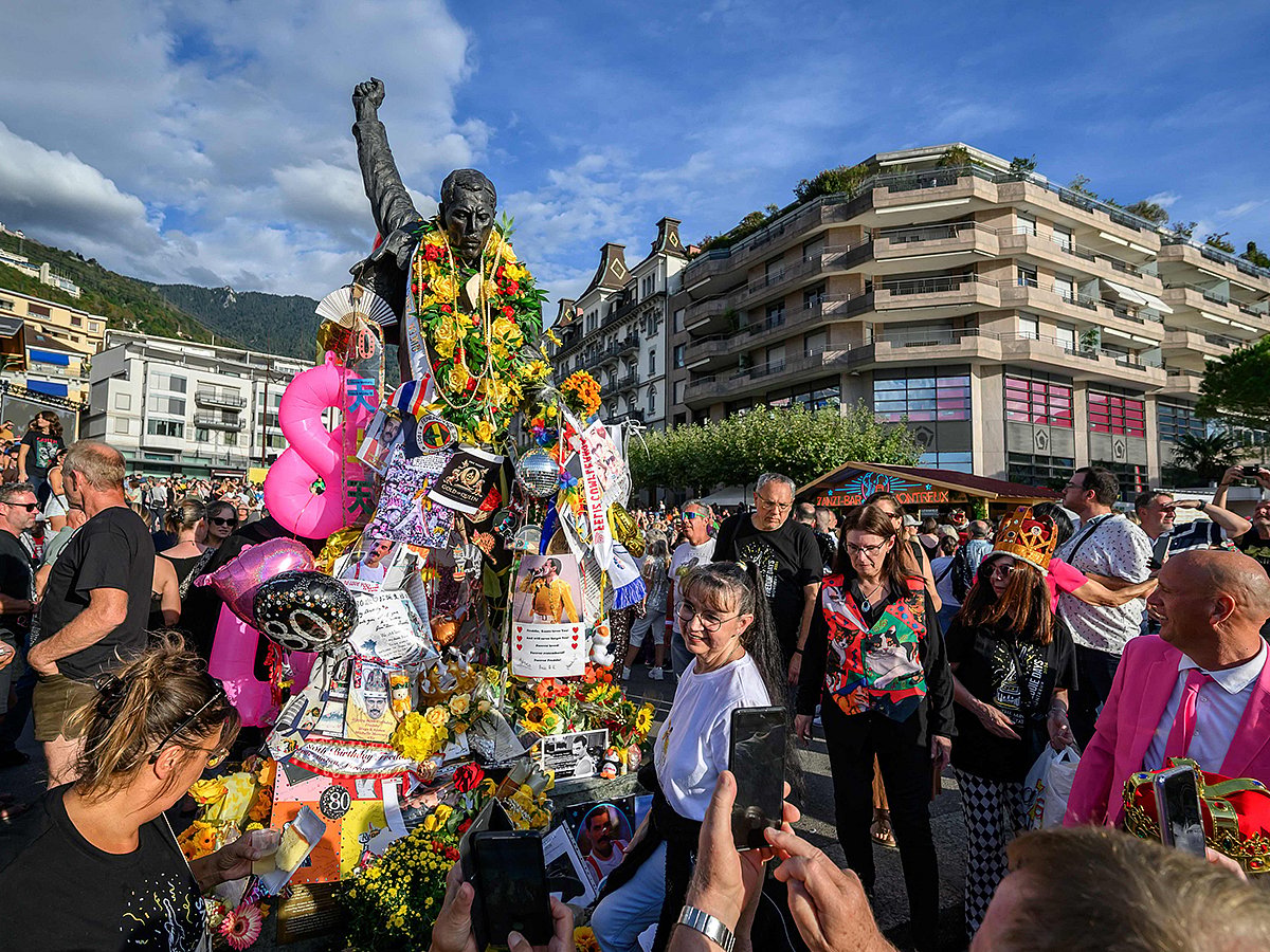 Fans gather around the iconic Freddie Mercury statue overlooking Lake Geneva during Montreux Freddie Day, marking the 80th anniversary of the birth of the Queen frontman, in Montreux, Switzerland, on September 5, 2026. 